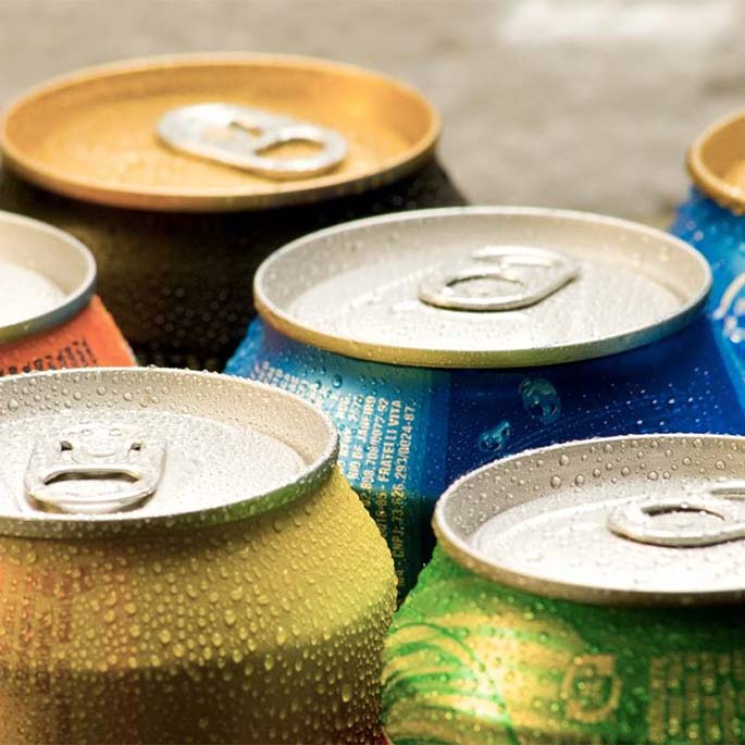 Colorful ice cold drink cans.